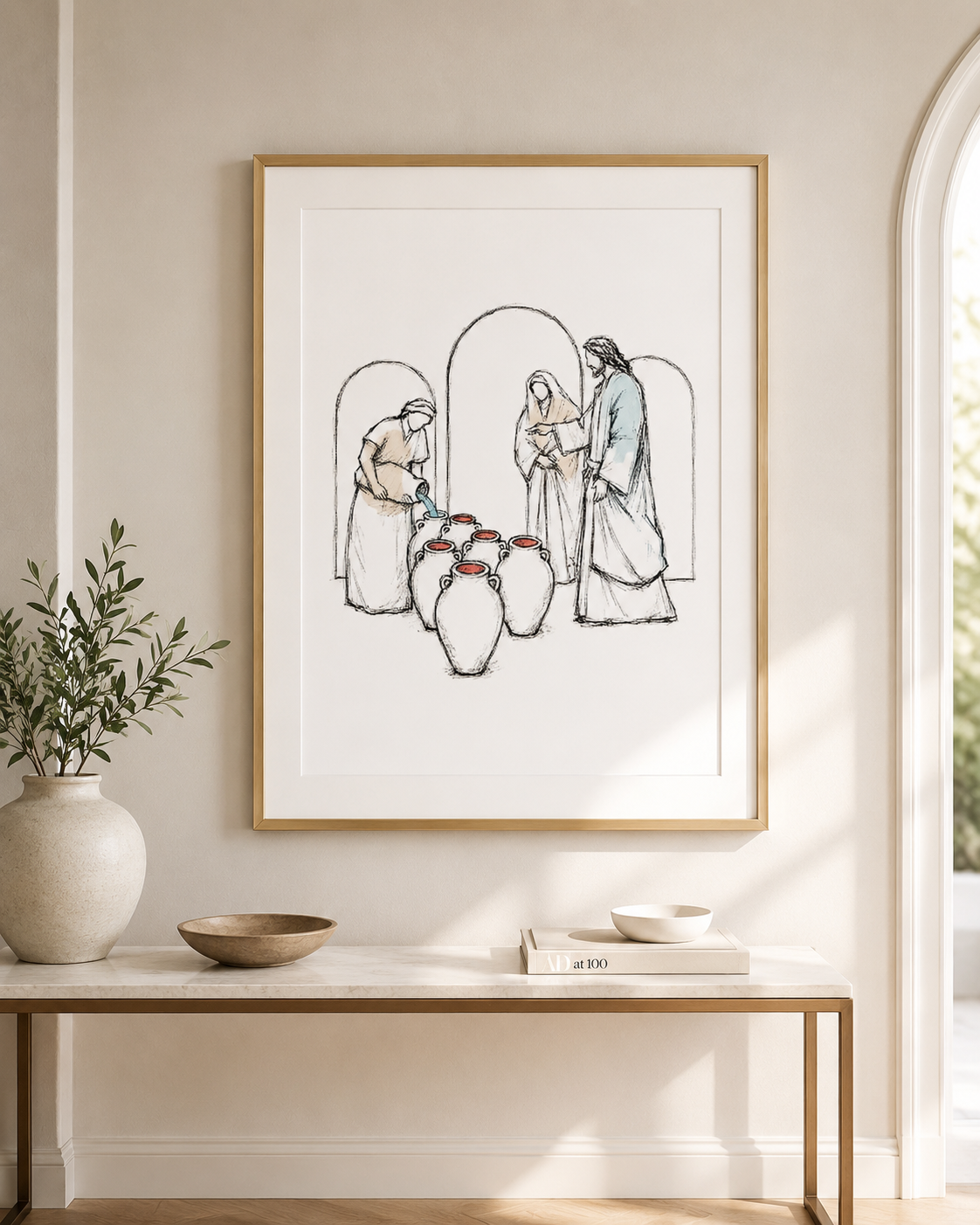Jesus turns water into wine print framed above a home office desk