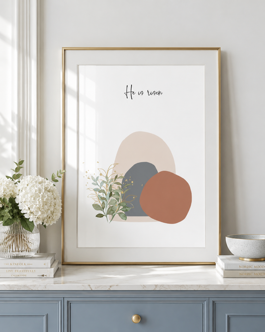 He Is Risen wall art on an entryway console table styled with vases and greenery