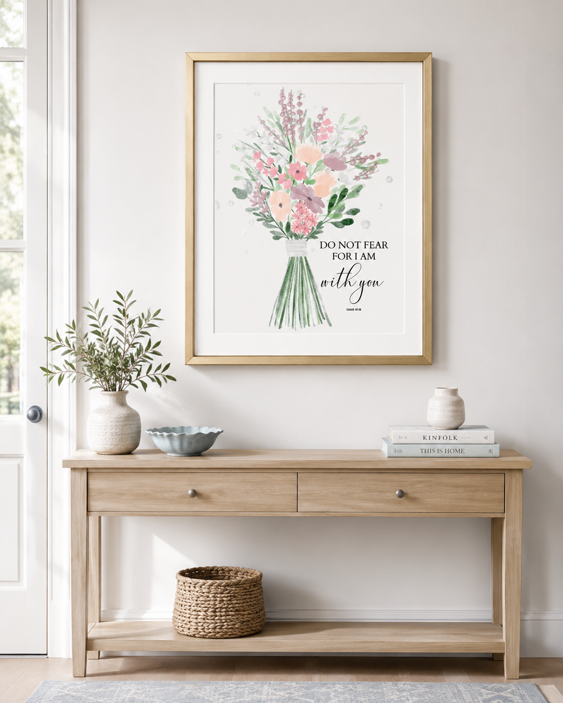 Framed Isaiah 41:10 wall art print on a console table near an entryway