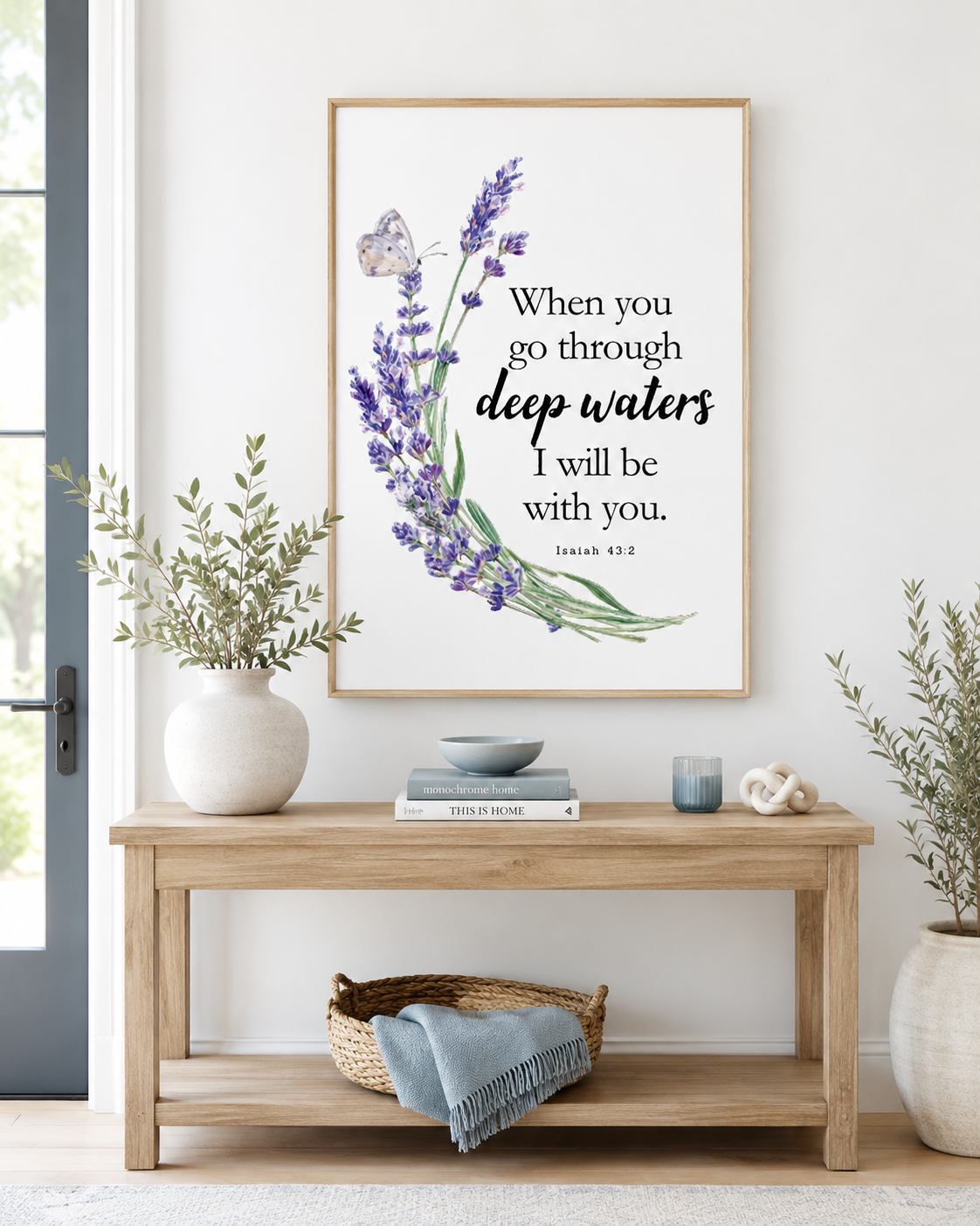 Framed Isaiah 43:2 wall art print on a console table near an entryway