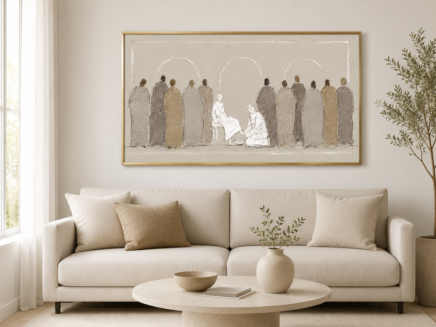 Jesus Washes the Disciples' Feet framed print above a living room sofa