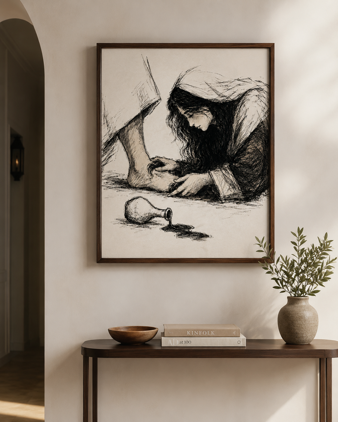 Textured ink sketch of Mary anointing Jesus's feet framed on a console table