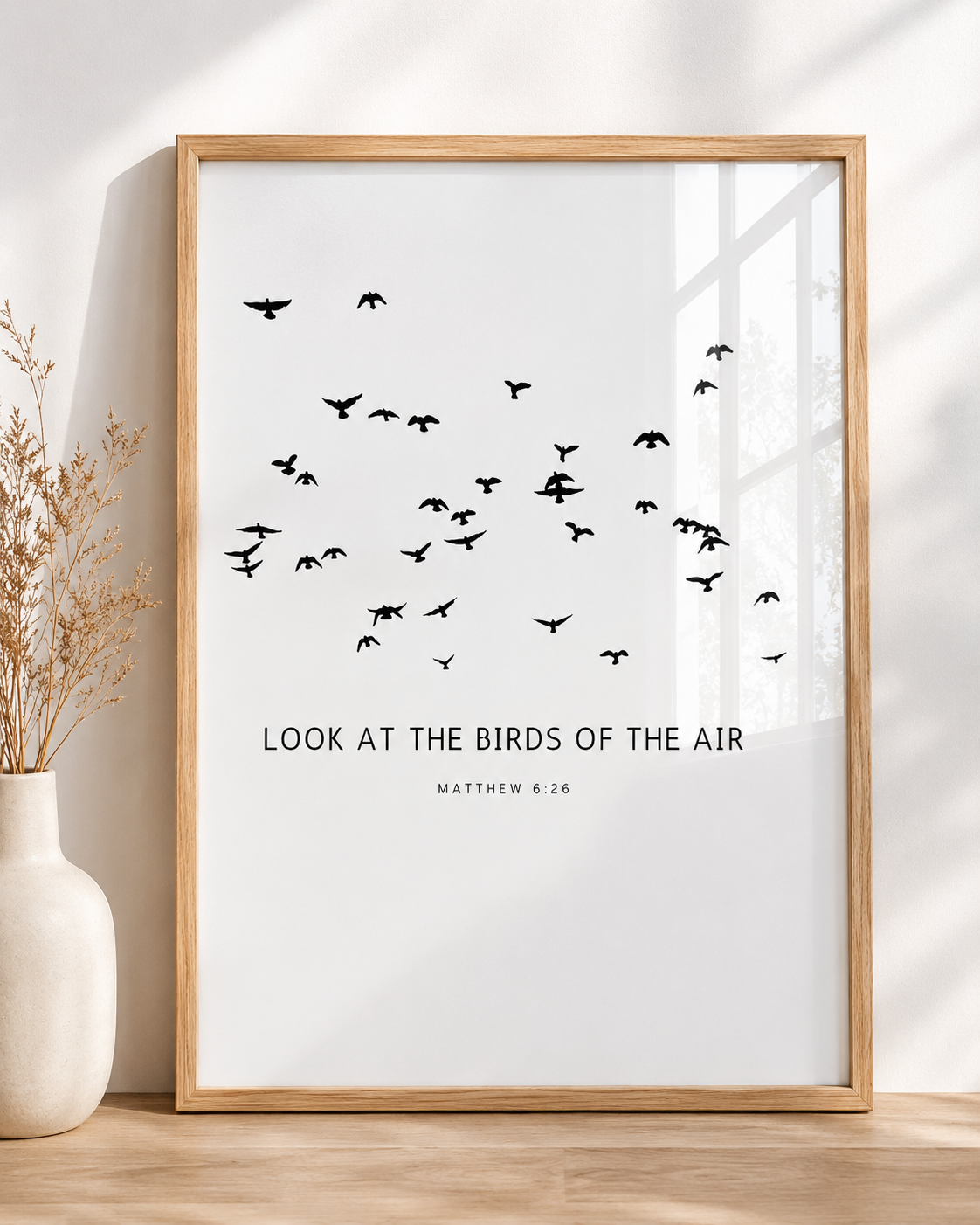Matthew 6:26 wall art print in a white frame showing the full "look at the birds" scripture text