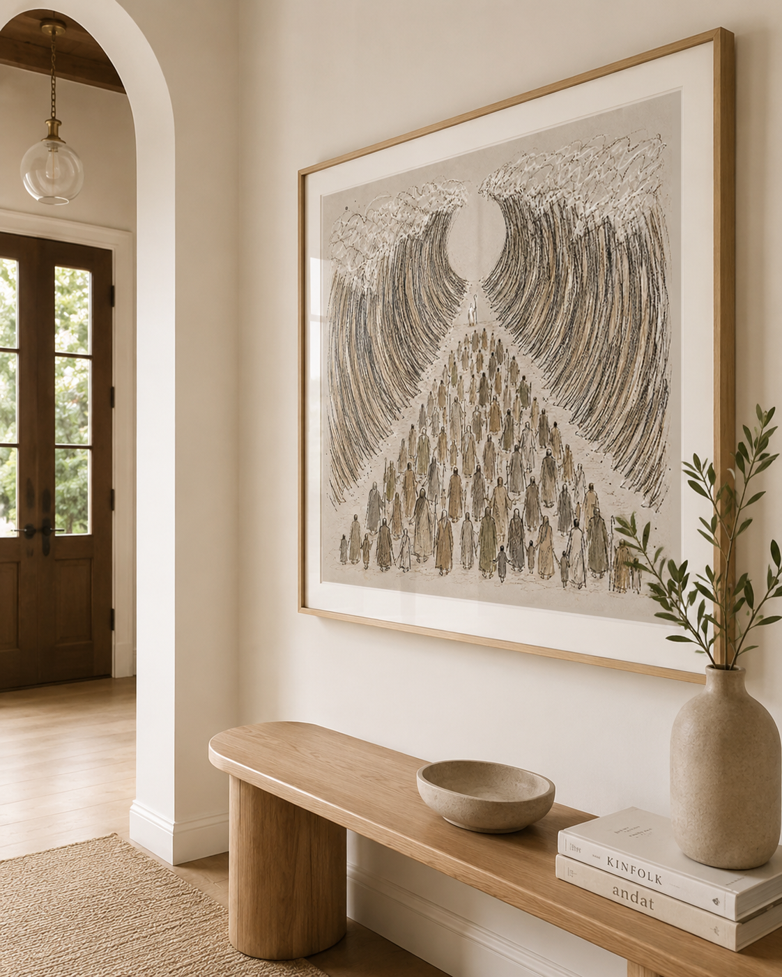 Framed Moses parts the Red Sea wall art print on a console table near an entryway