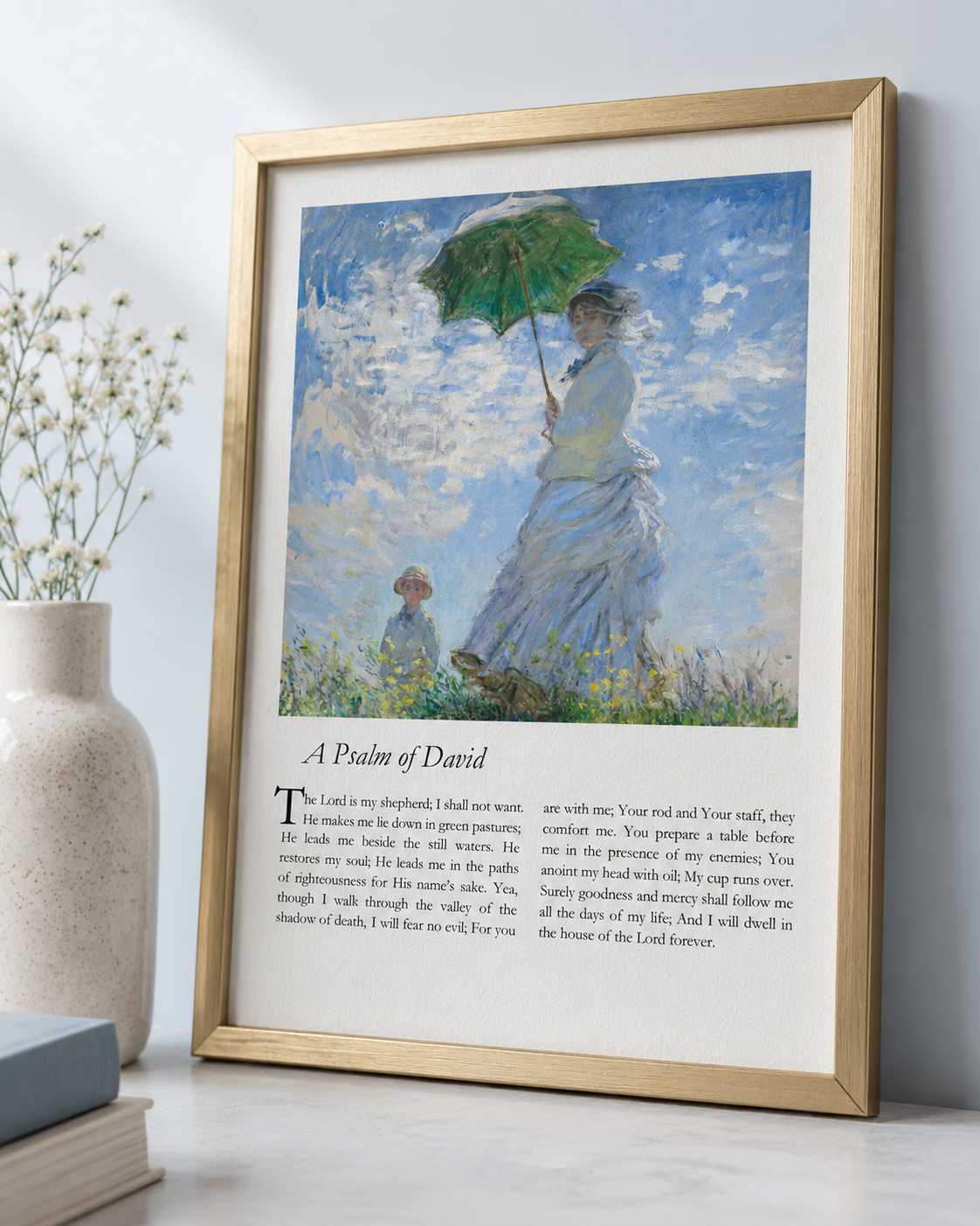 Psalm 23 art print in a gold frame with impressionist meadow painting, leaning against a wall