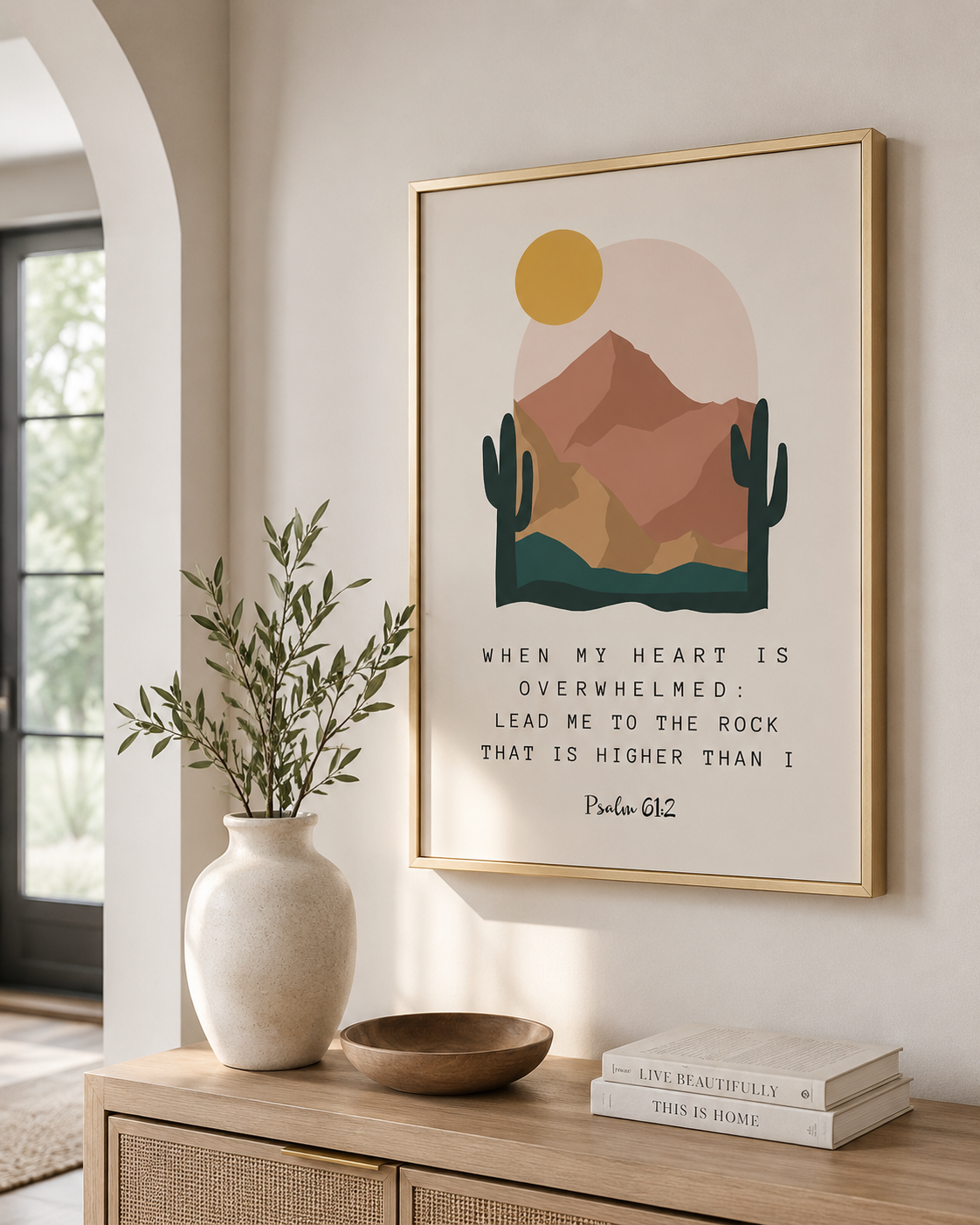 Framed Psalm 61:2 wall art print on a console table near an entryway