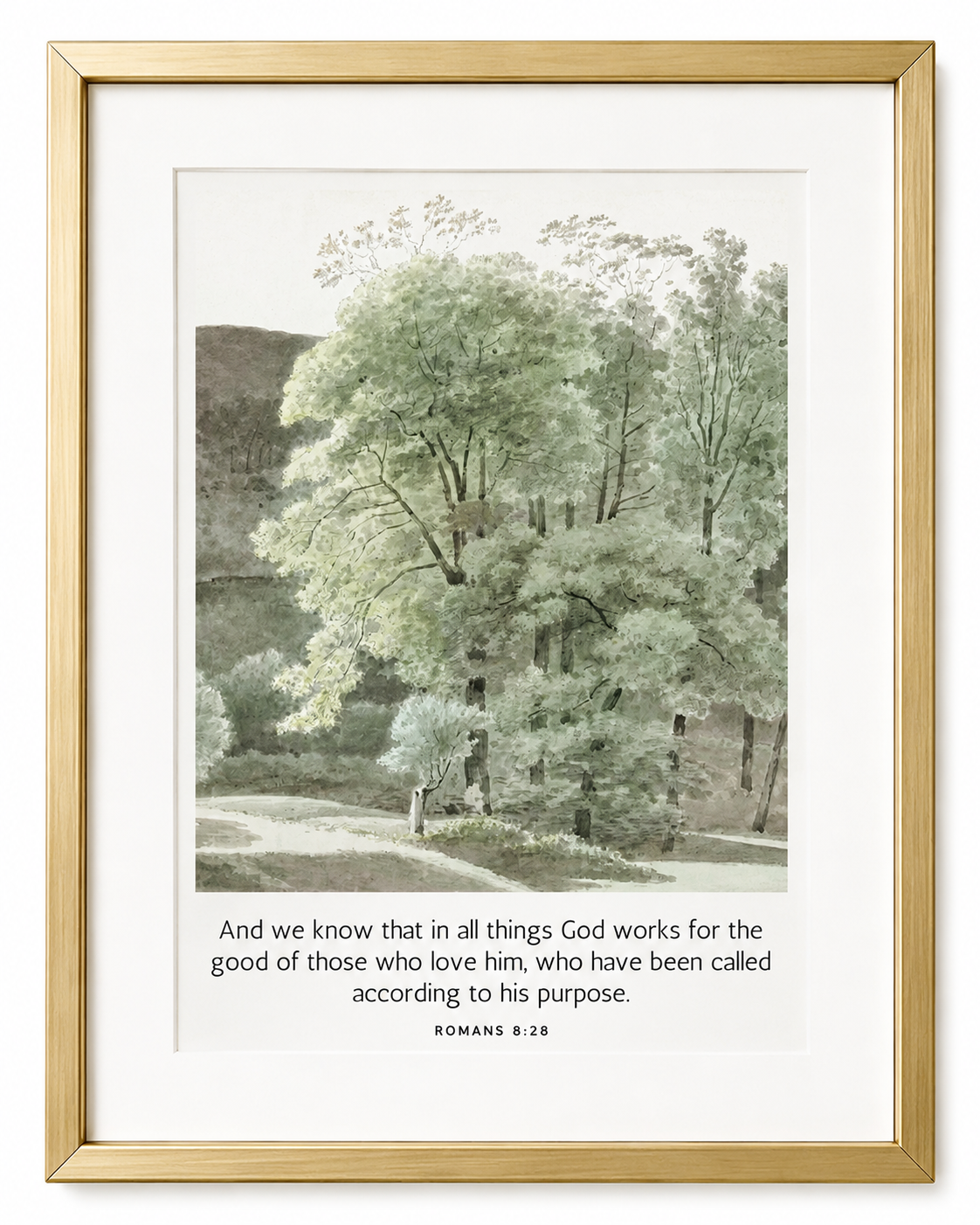Close-up of Romans 8:28 wall art in a gold frame with watercolor tree landscape design