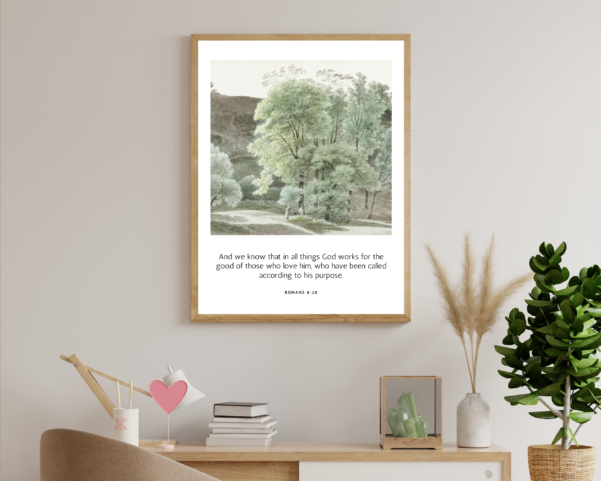 A wall hanging with uplifting words of Romans 8:28, proclaiming God's promise to work all things for good.